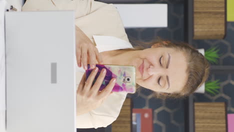Vertical-video-of-Business-woman-chatting-online-facetime.